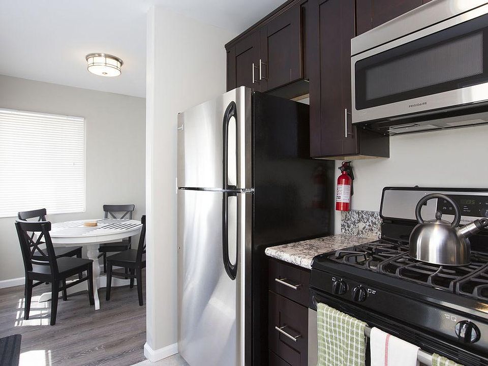Our Granite top kitchen with stove, oven, and stainless stee