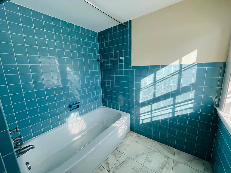 Full bathroom on second floor (showing tub/shower)