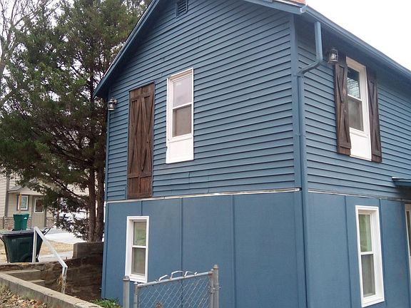 Parking space next to house, landscaping is coming and yard maintenance is included
