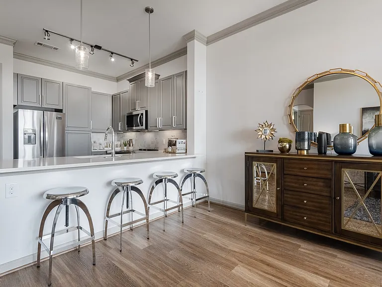 Sleek Kitchen and Dining Space at The Hendry Apartments