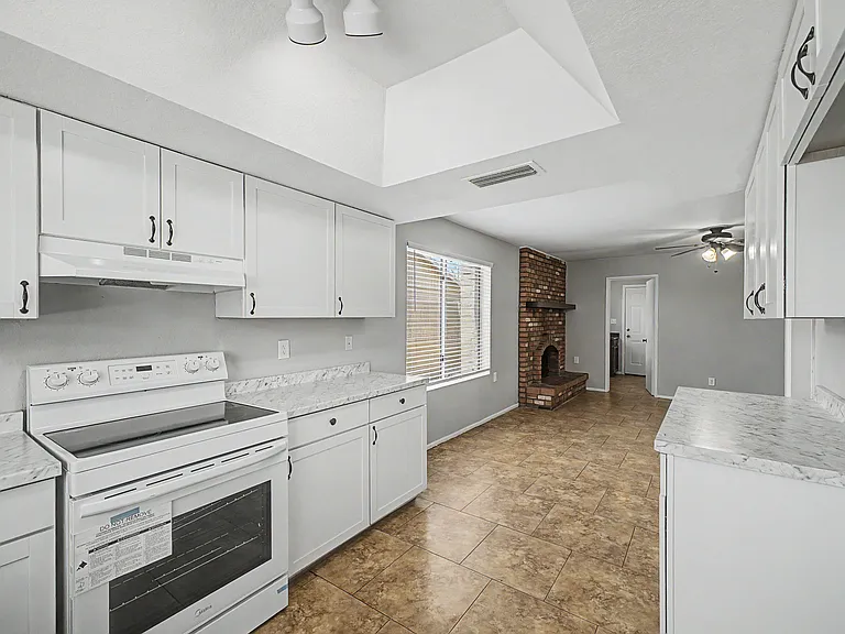 Kitchen view to family room