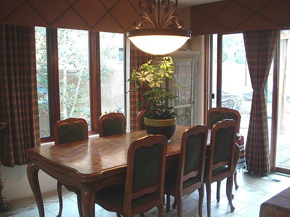 Spacious dining room with walk-out to the private patio.