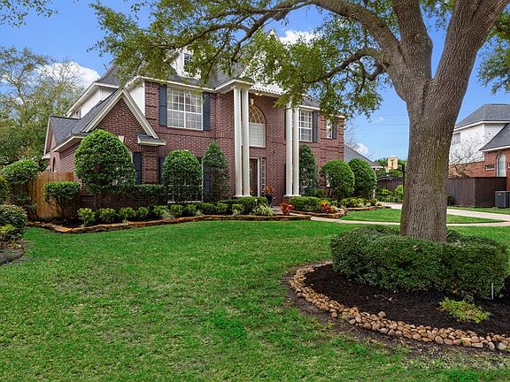 This a very generous size lot and house is surrounded by lovely mature trees and nestled in one of the most desirable communities in the area; Spring Creek Oaks !! This beautiful house is zoned to highly rated KLEIN schools. The newest park is only 2