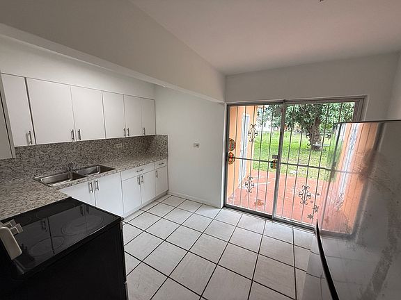 4th image of 9927 NW 26th Ave