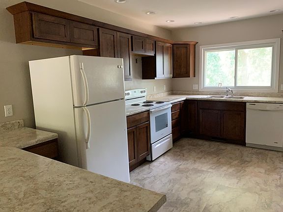 Kitchen looking towards the back yard/patio/rear decl