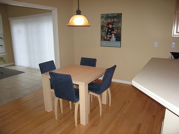 eat-in kitchen open to sunroom