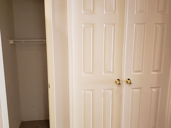 Utility Closet and First Bedroom/Home Office