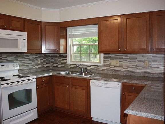 Updated kitchen with new appliances.