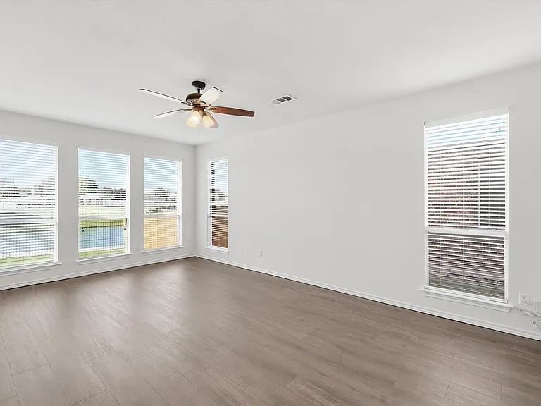 Large spacious primary bedroom with spectacular views of the water and so much light.