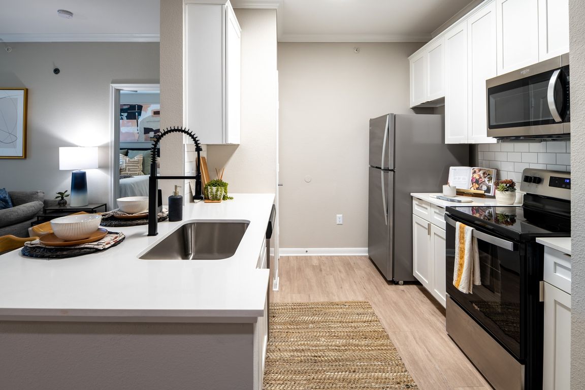 Renovated Kitchen with Stainless Steel Appliances