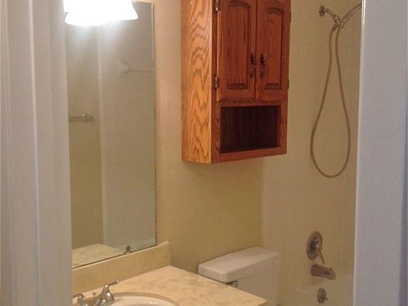 SECOND BATHROOM WITH TILE FLOORING