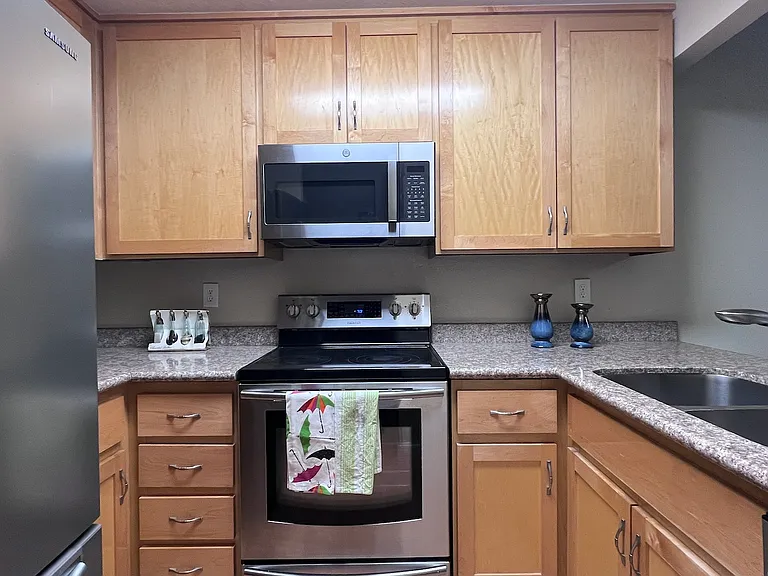 The furnishings shown in the photos are for staging purposes only. Unit is rented unfurnished.