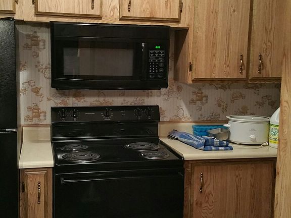 new black stove and microwav