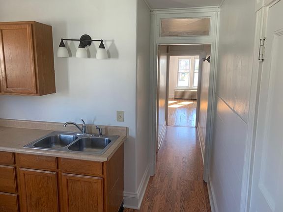Hallway leading from kitchen to living room