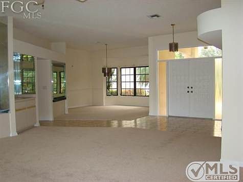 Living to Dining area Showing front foyer. New Carpets, new paint.