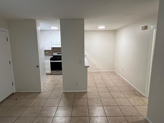 Looking towards kitchen and dining area