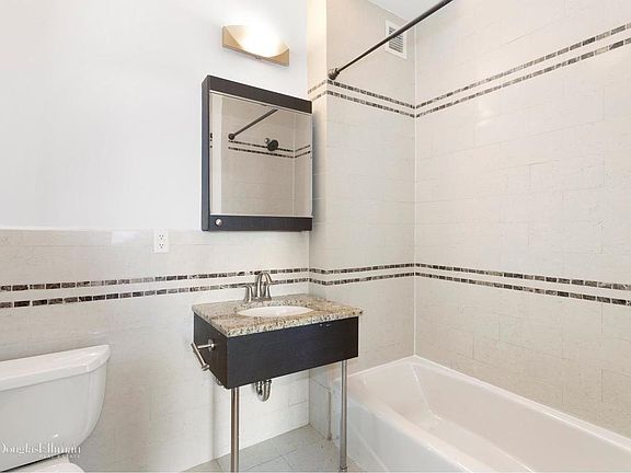 5th image of 1059 50th Ave APT 6R