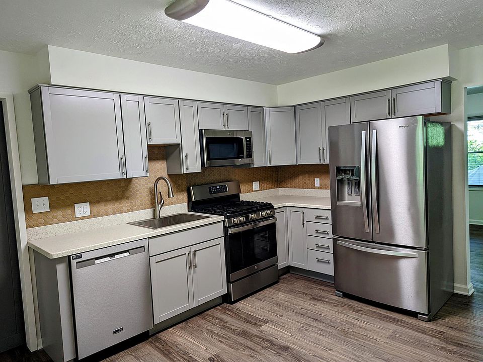 Kitchen - all appliances new in Spring 2022. Range has center griddle, 25" rectangular, extra deep stainless-steel sink, lots of cupboard space!