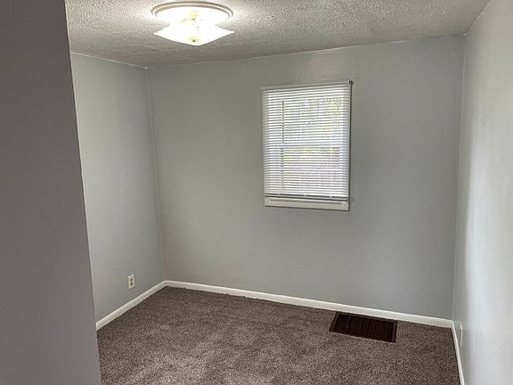 5th image of 4877 W River Dr NE