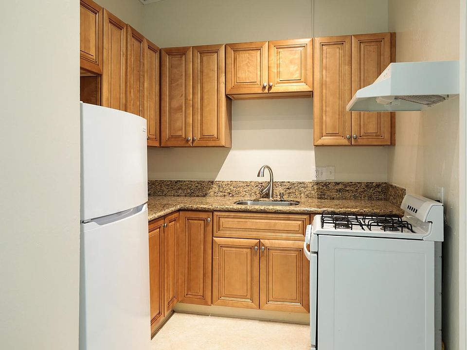 Remodeled kitchen with granite counters & custom cabinets