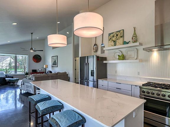 Open kitchen to living room with natural lighting