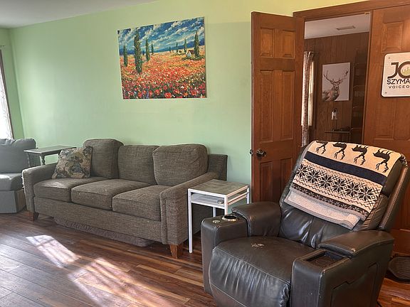 Living room with doors into Family Room