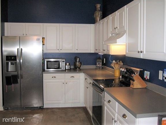Upgraded Kitchen opens to Living Room.