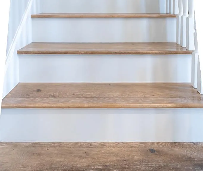 Let's go upstairs to the landing which has an office nook, then entrances to 3 of the 4 bedrooms, and laundry!