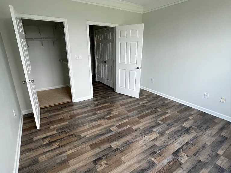 Bedroom with new LVP flooring
