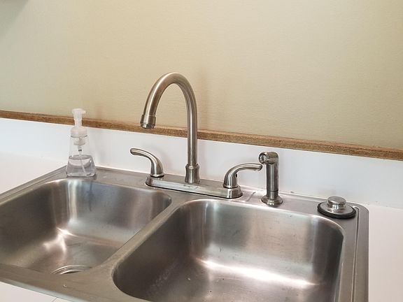 Double sink with high faucet perfect for filling your pots