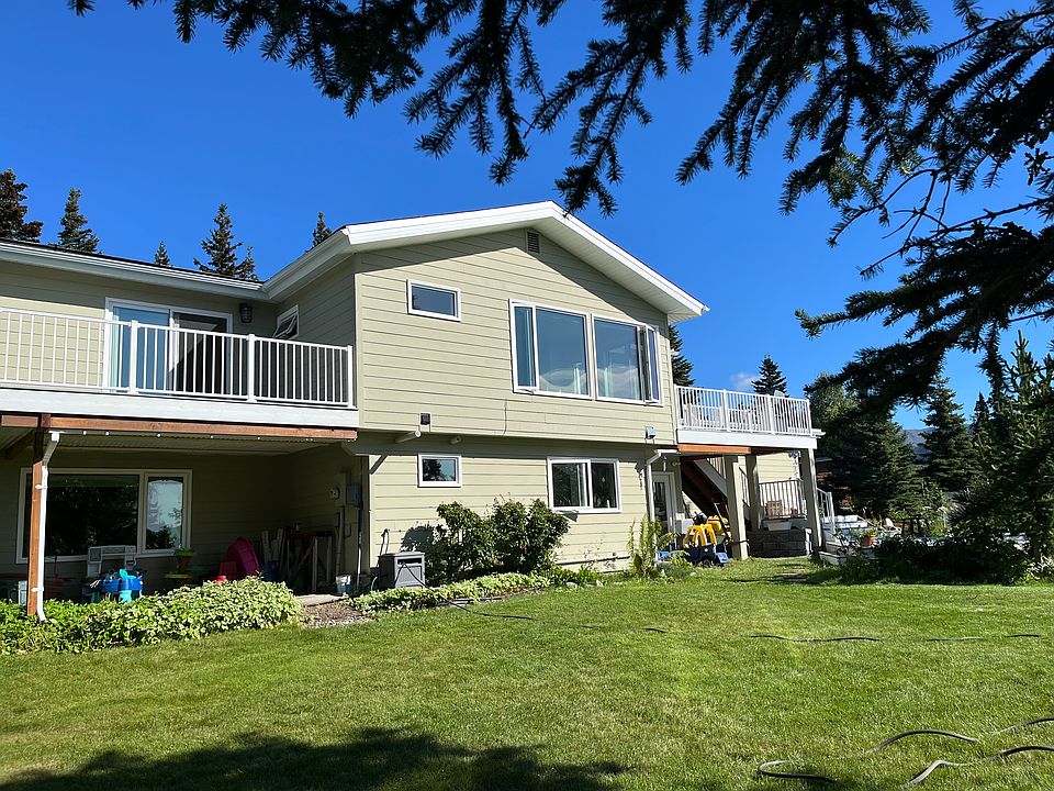 Back of house. Upper unit is currently for rent.