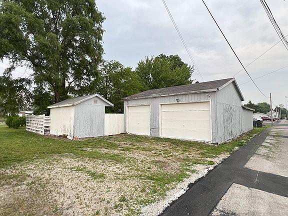 Backside of property. Rear of Garage with two bay doors.