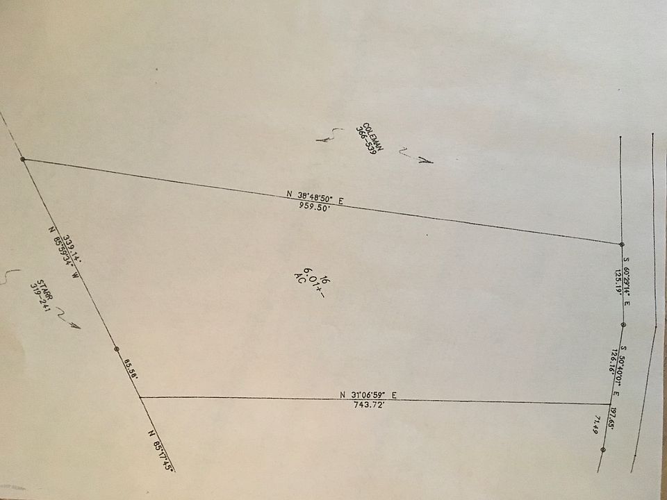 Six wooded rolling acres