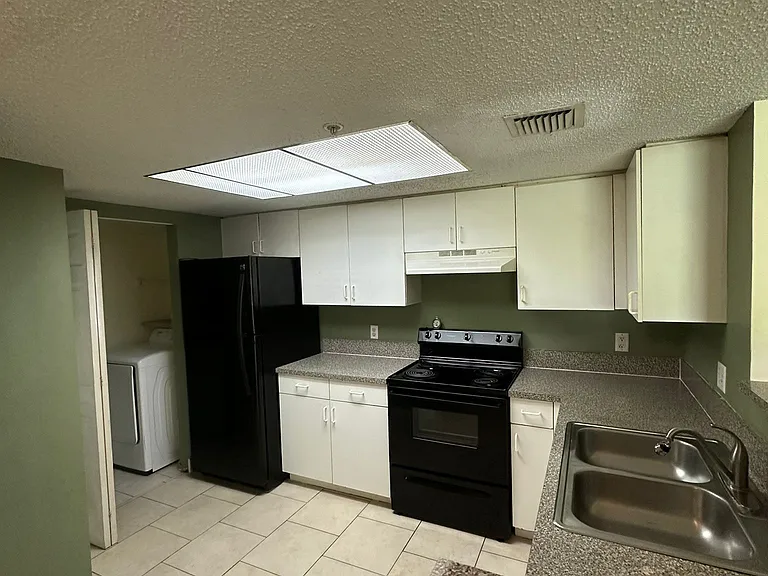 5005 Wiles Rd — Photo 35