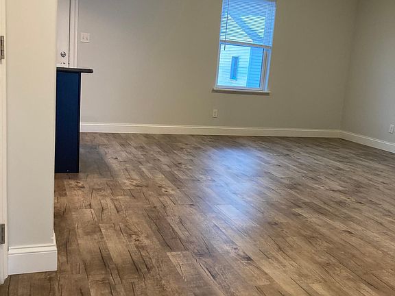 Open floor plan kitchen, living area & dining area