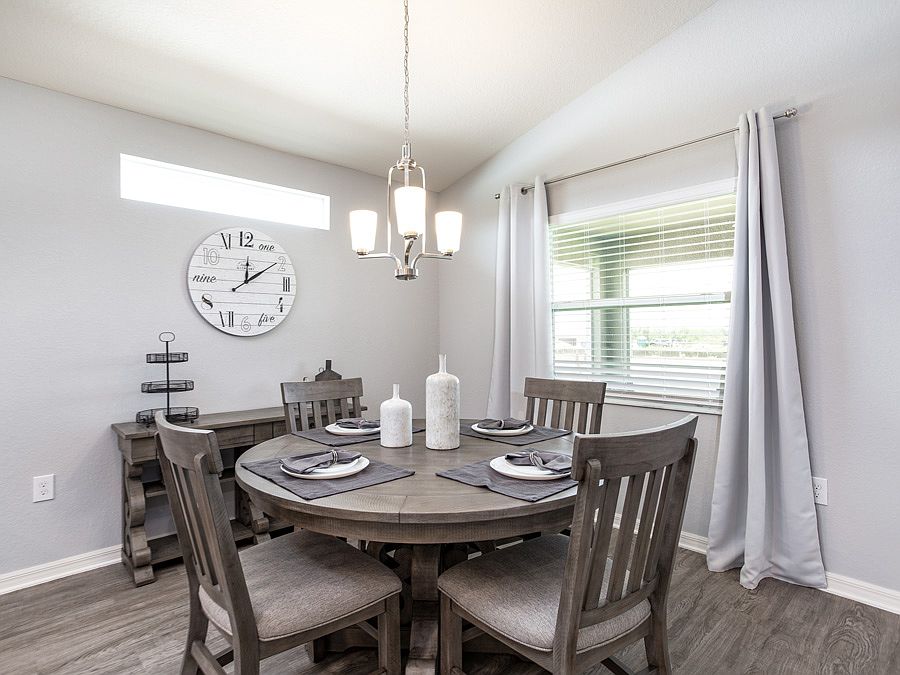 Brand-new home for sale in Eagle Lake, Florida, with 3 bedrooms plus a den Photo showcases the home