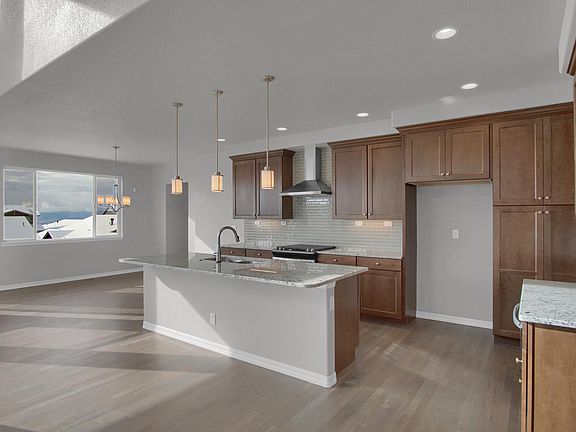 Open Kitchen Photo representing home to be built and may demonstrate optional features