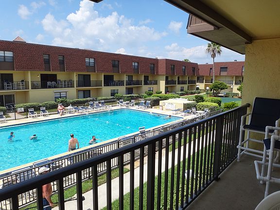 Balcony overlooks pool
