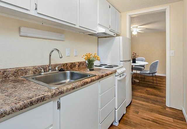 Prepare meals with ease in kitchens equipped with contemporary appliances, ample cabinetry, and functional layouts.