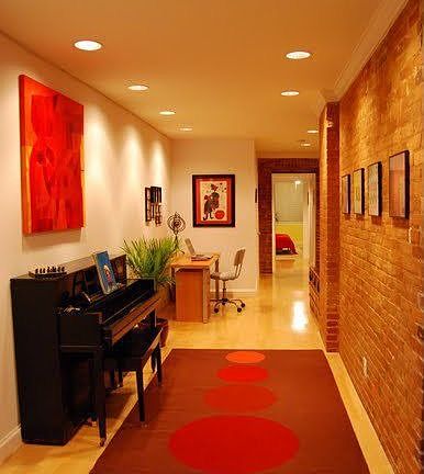 The entrance hallway is big enough for a piano!