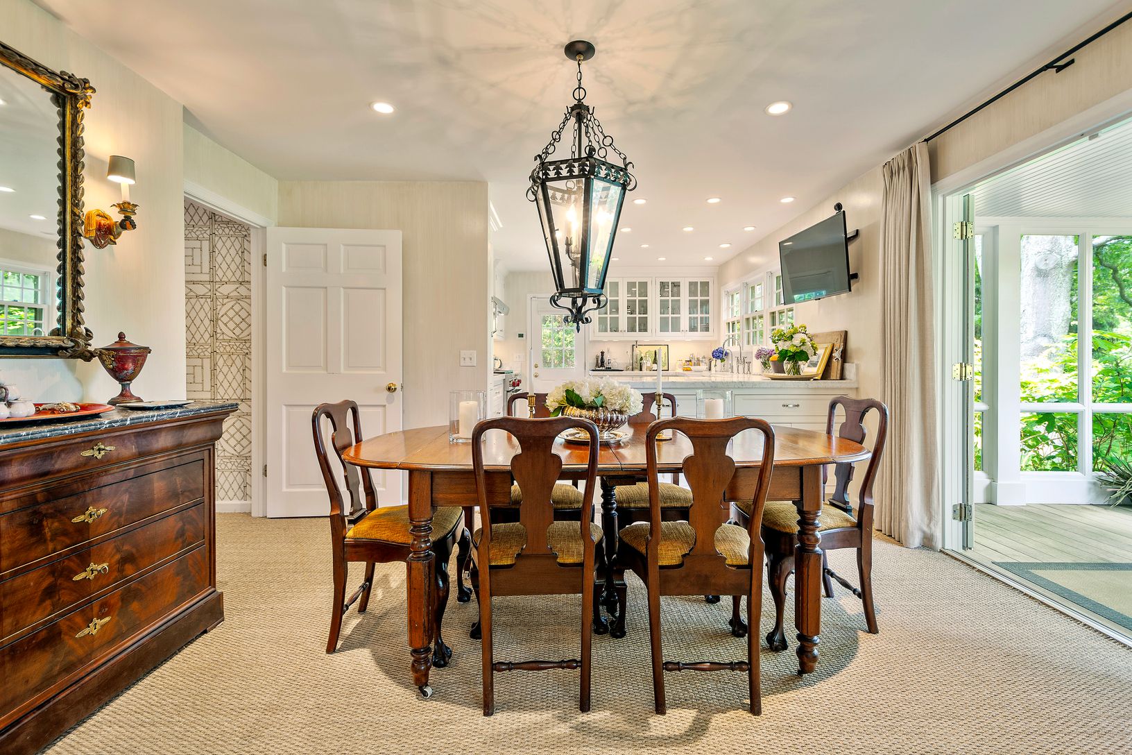 Dining room open to screened porch