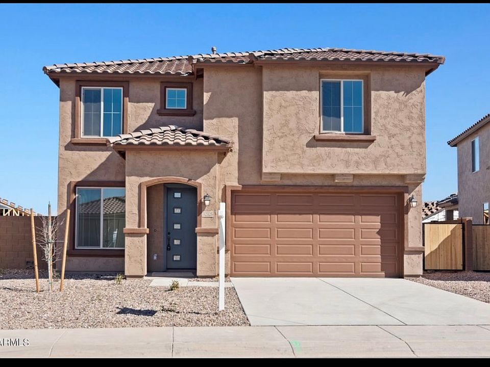 4 bedroom, 3 1/2 bathroom with a Den and loft. RV gate and huge backyard.