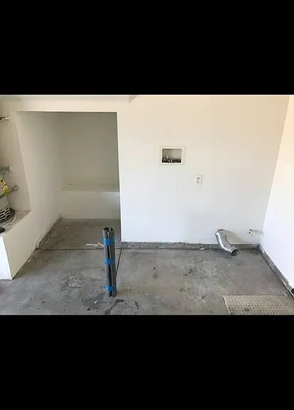 Laundry hook-ups in large 2 car garage