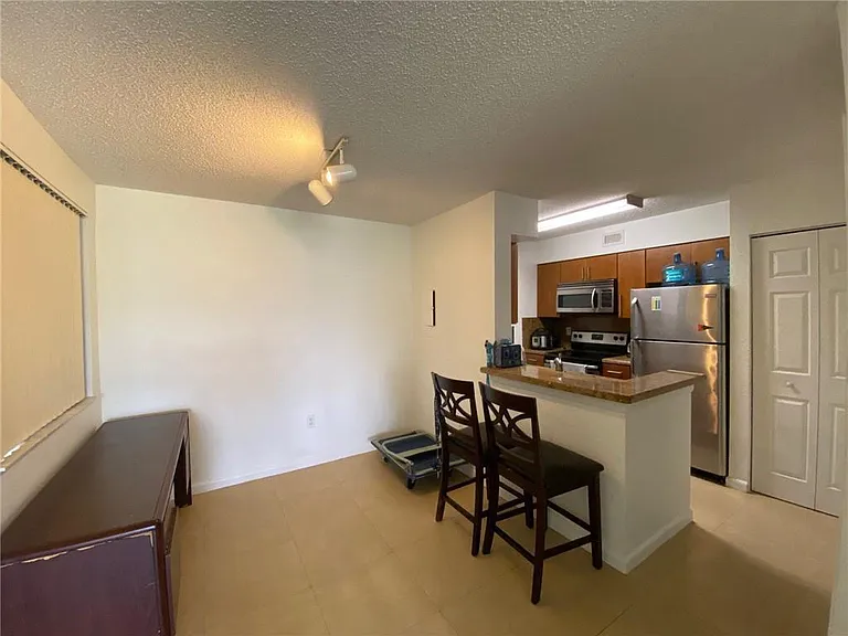 2841 N Oakland Forest Dr #107 — Photo 4