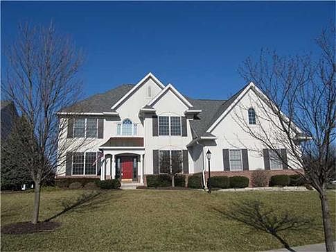 Welcome to 5922 Trading Post Place! You're sure to love this luxurious 5BR/4.5BA home in the popular Prairie View golf course community of Moffitt Farms!