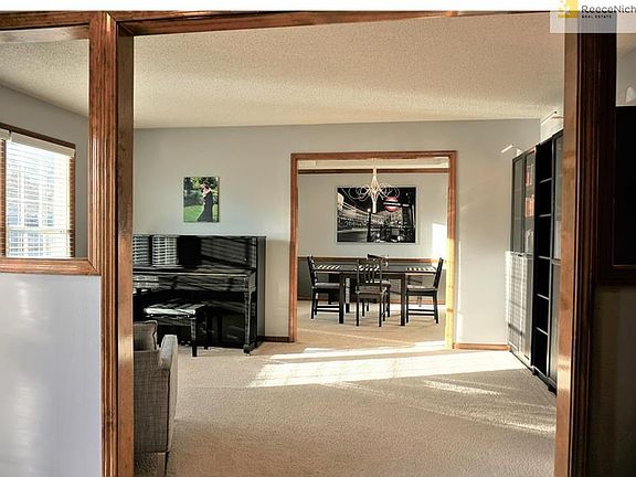 Formal entry view to living room and dining room.