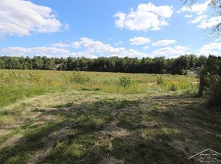 5726 N Sanford Beach Dr, Sanford, MI 48657