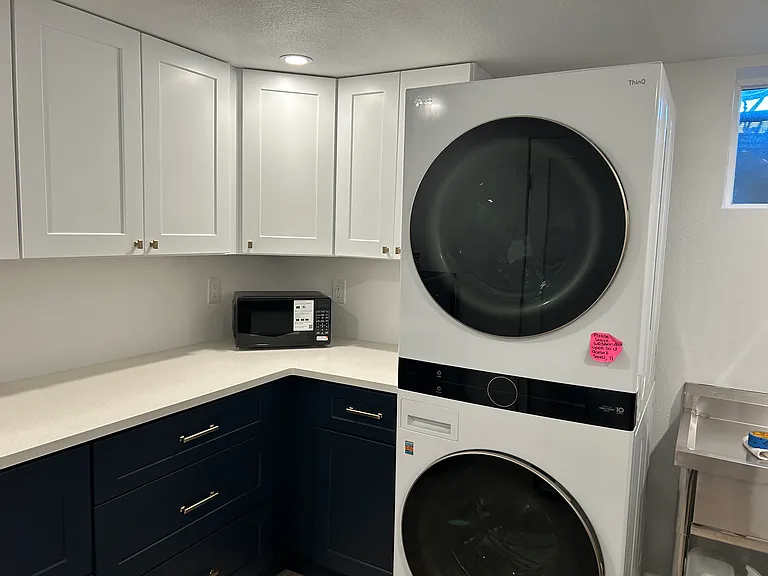 Brand new kitchenette with washer & dryer. This room is shared with the homeowner.