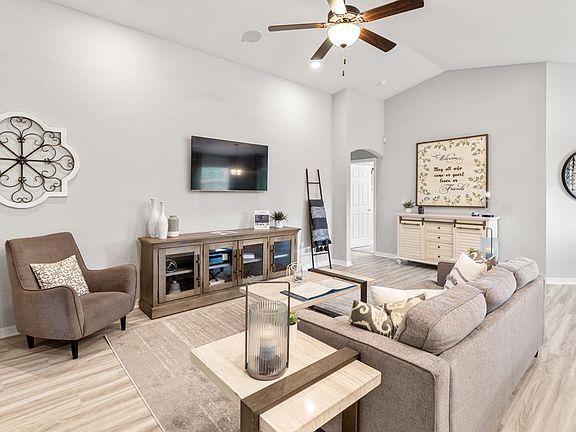 Enjoy a sunny, open living area with LVP flooring.