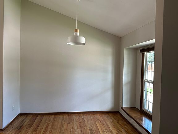 Dining room with large window & window bench